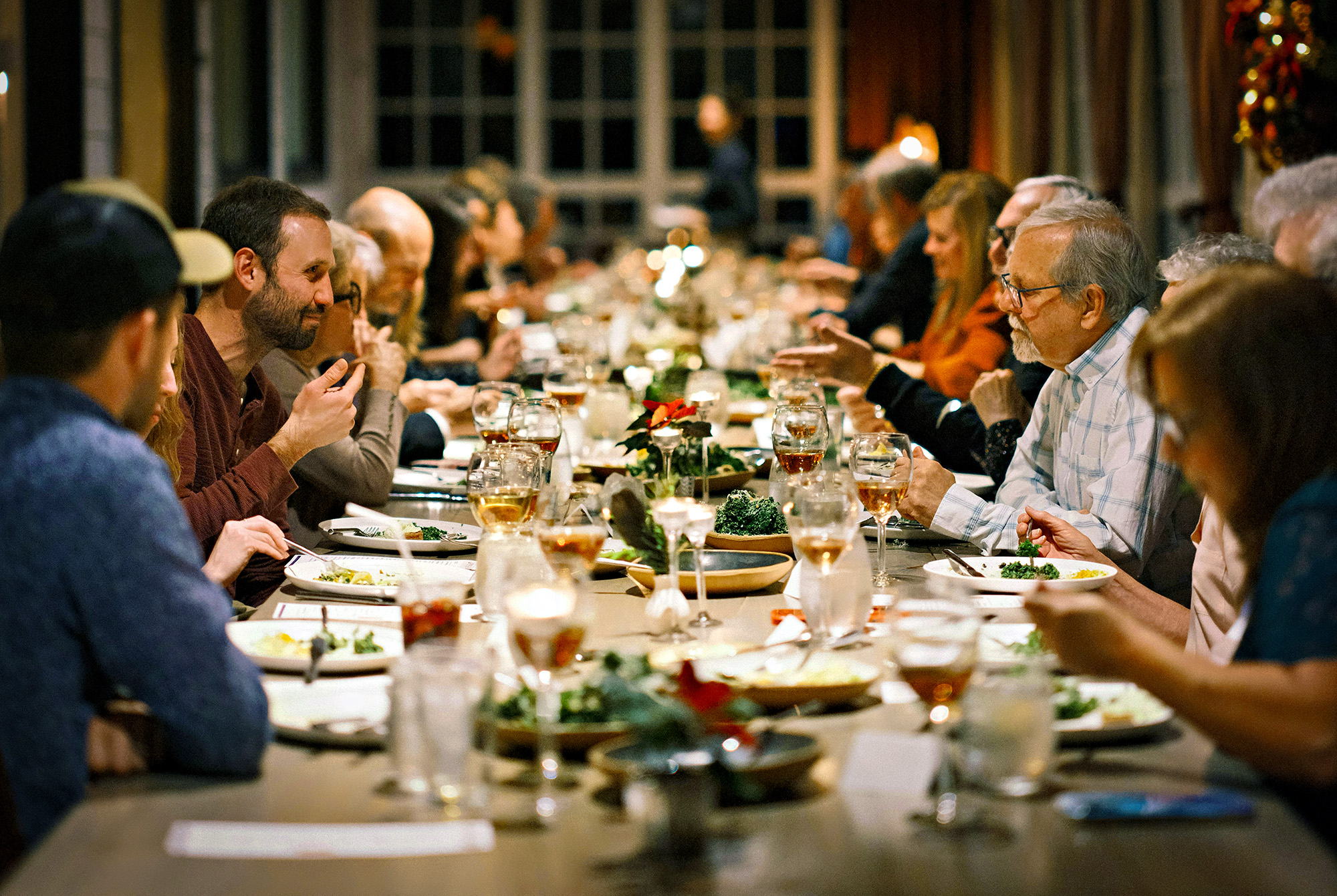 Holiday dinner family around a decorated table